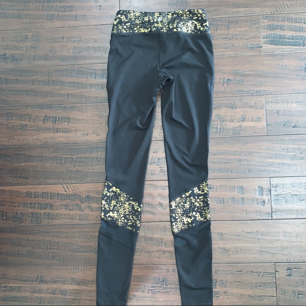 Gaiam Black Leggings with Gold Accent and Mesh Panels - Picture 6 of 10